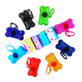 Cat Park ready keychain with attached small trash bag pouches, durable plastic material, ideal for pet waste disposal.